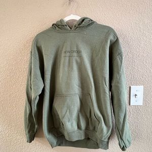 Green hoodie with floral details